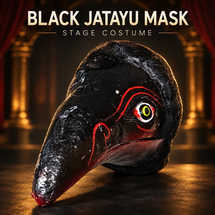 Black Jatayu Mask displayed in a theatrical setting