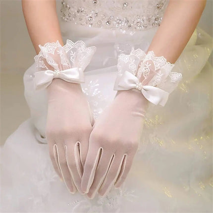 Fancydresswale Girls Fancy Lace Gloves with Satin Bow – Short Wrist Length – Party & Princess Dress Accessory fancydresswale.com