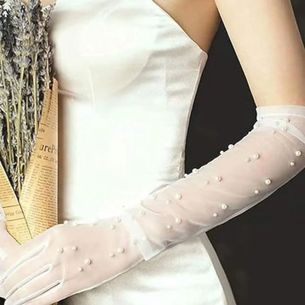 Fancydresswale Long Sheer Mesh Gloves with Pearl Embellishments – Elegant Transparent Party Gloves for Girls & Women fancydresswale.com