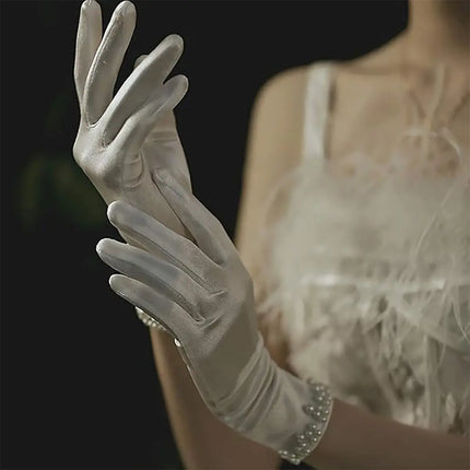 Fancydresswale Satin Gloves with Pearl Detail – Elegant Wrist-Length Gloves for Women & Girls fancydresswale.com