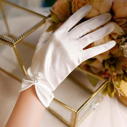 Fancydresswale White Satin Gloves with Pearl Drop Charm – Elegant Wrist-Length Gloves for Girls & Women fancydresswale.com