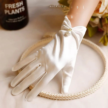 Fancydresswale White Satin Gloves with Pearl Drop Charm – Elegant Wrist-Length Gloves for Girls & Women fancydresswale.com