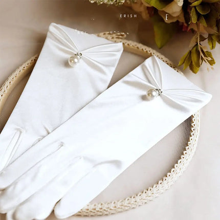 Fancydresswale White Satin Gloves with Pearl Drop Charm – Elegant Wrist-Length Gloves for Girls & Women fancydresswale.com