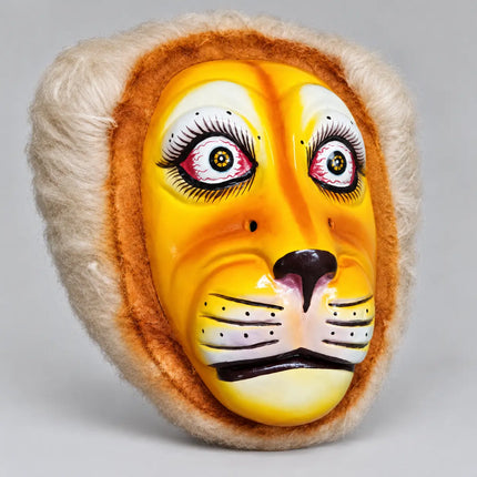 Three-quarter view of Fibre Tiger Mask showing shaped face and textured edging