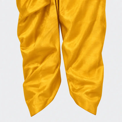 Golden-yellow dhoti lower leg and hem close-up preview