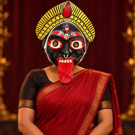 Performer styling Kali Mask with a red saree
