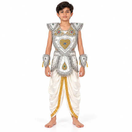 Boy aged 8 to 12 wearing silver and gold kavach with white dhoti, front view