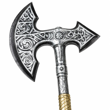 Close-up of silver-tone axe-shaped head with scroll patterns