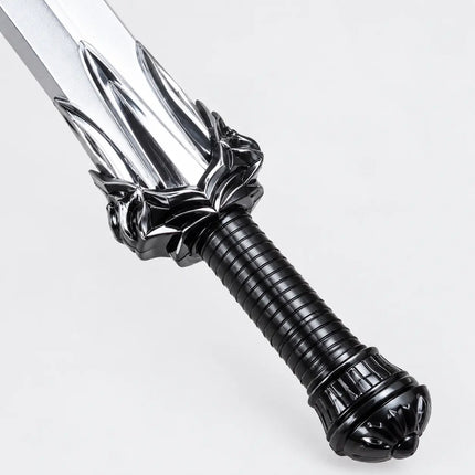 Close-up of Samurai Talwar sculpted guard and ribbed black handle