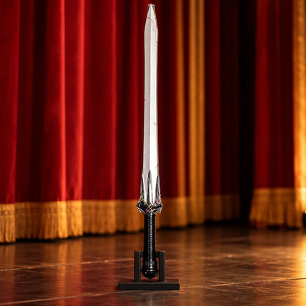 Silver-and-black Samurai Talwar displayed on stage with a separate stand