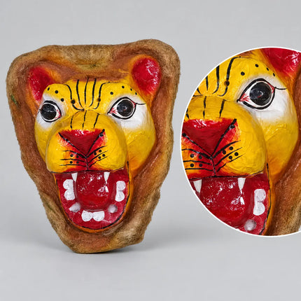 Close-up of painted facial details and open-mouth design