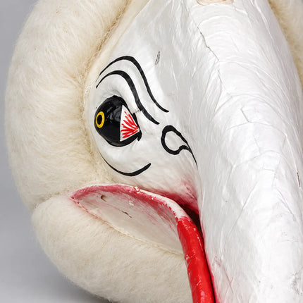 Close-up of painted eye and textured border on White Jatayu Mask
