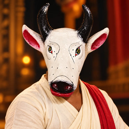 Performer wearing Nandi Mask with traditional stage clothing