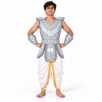 Young man wearing silver kavach with white dhoti